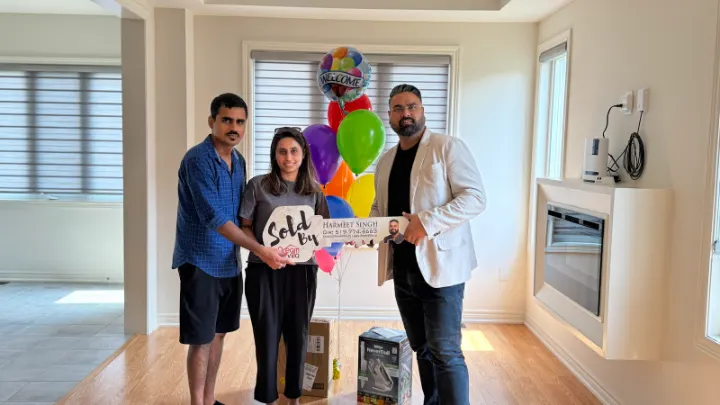 Dream Villa clients with Harmeet Singh on the day they got their home
